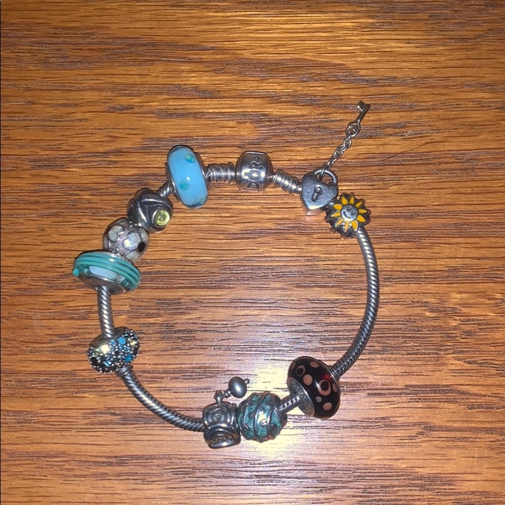 Silver Pandora bracelet with 10 charms